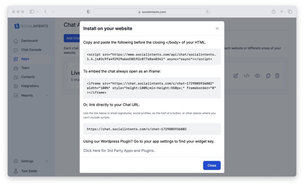 Screenshot of instructions guiding users on how to copy and paste a live chat embed code snippet into a website—showing the practical steps of AI embedding.